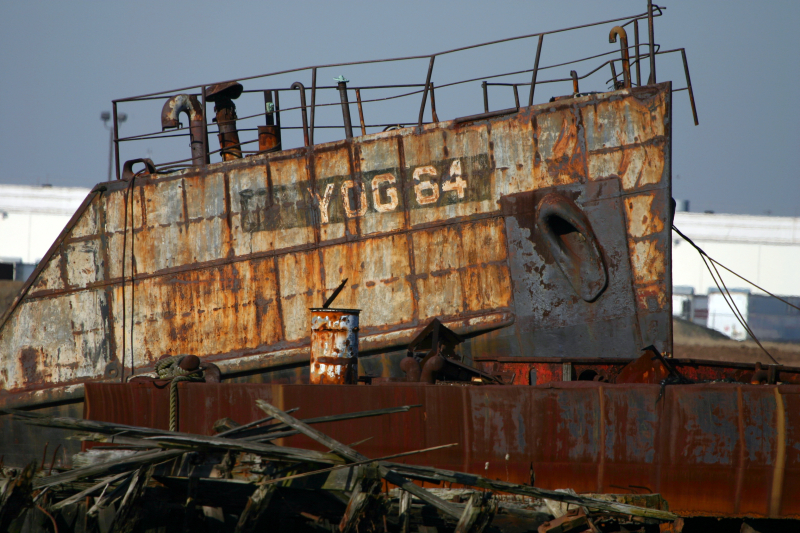 The name YOG 64 is visible on the bow of this Navy gas carrier built in 1945 and beached since 1976 in Witte's ship graveyard. (Gordon Donovan)