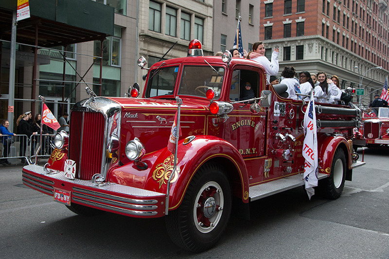 An old FDNY fire engine carrying veterans and their families during the Veterans Day parade on Fifth Avenue in New York on Nov. 11, 2014. (Gordon Donovan) 