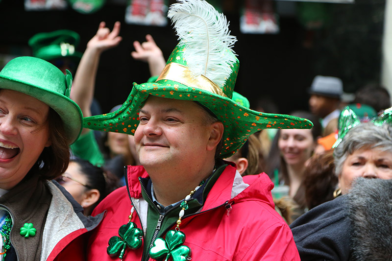 Watchers look festive while watching the St. Patrick's Day Parade, March 17, 2015, in New York. (Gordon Donovan)