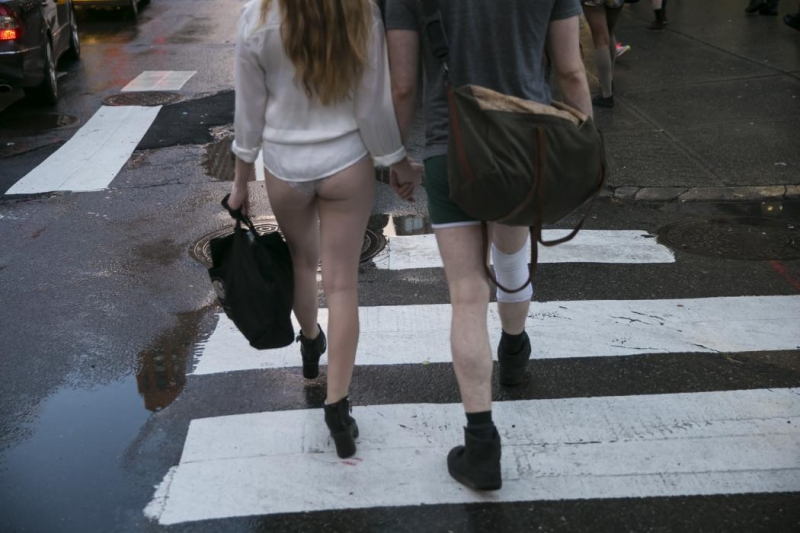 A young couple participating in the No Pants Subway Ride head towards Union Square Station in New York City, Sunday, Jan. 10, 2016. (Gordon Donovan/Yahoo News)