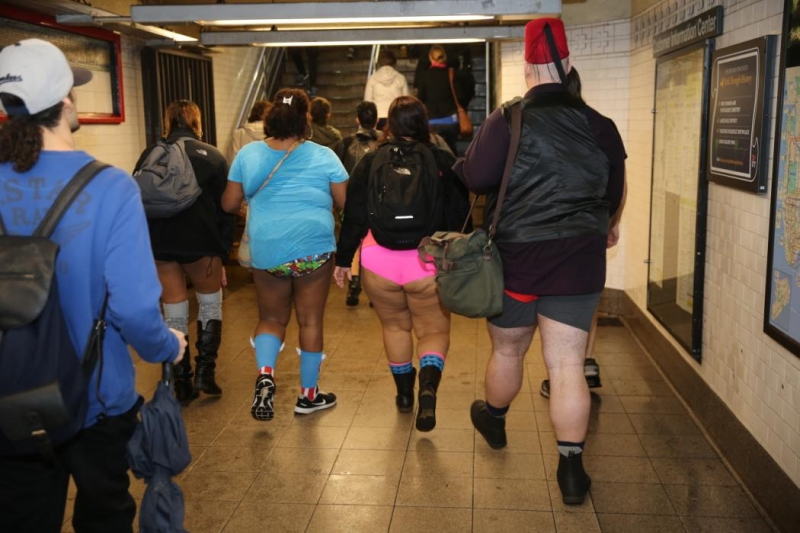 Participants of the No Pants Subway Ride head towards Union Square in New York City, Sunday, Jan. 10, 2016. The 'No Pants Subway Ride' is an annual event that has become a global celebration of bare thighs. The 'celebration of silliness' is designed to make other subway riders smile. (Gordon Donovan/Yahoo News)