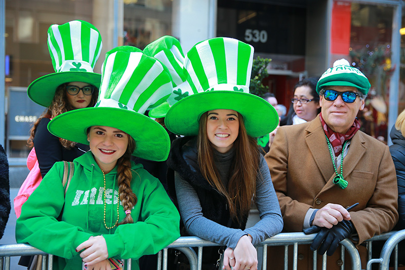Spectators look festive while watching the St. Patrick's Day Parade, March 17, 2016, in New York. (Gordon Donovan/Yahoo News)