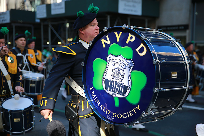 A member of the NYPD Emerald Society performs on Fifth Ave. during the St. Patrick's Day Parade, March 17, 2016, in New York. (Gordon Donovan/Yahoo News)