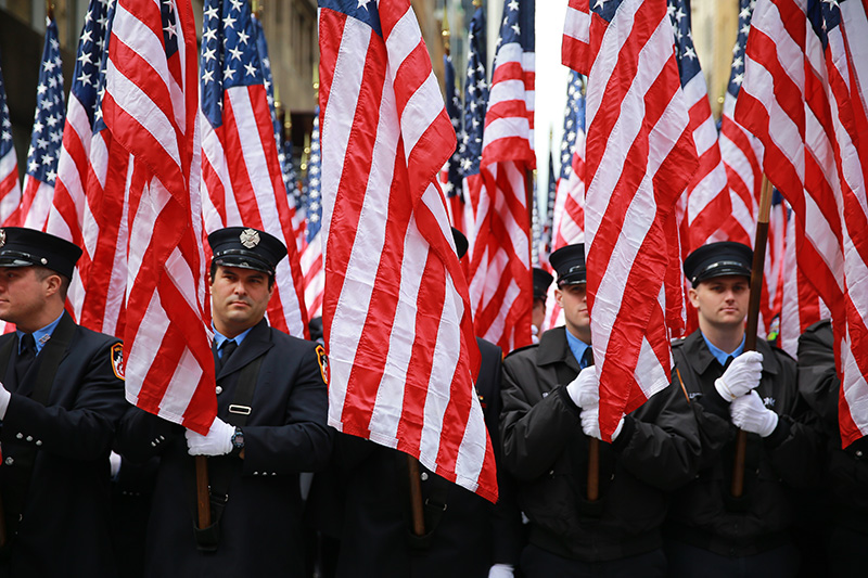 Members of the FDNY Color Guard await to march during the St. Patrick's Day Parade on March 17, 2016, in New York. (Gordon Donovan/Yahoo News)