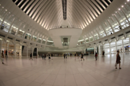 People walk through the Oculus mall at World Trade Center on Wednesday, August 17, 2016. Over 100 stores and restaurants opened Tuesday at the Westfield World Trade Center at the Oculus. The 350,000 square-foot mall opened nearly 15 years after the Sept. 11 terrorist attacks at the World Trade Center in 2001. (Gordon Donovan/Yahoo News)
