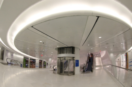 People walk through the Oculus mall at World Trade Center on Wednesday, August 17, 2016. The former shopping mall in the World Trade Center was one of the most successful properties in the world, but catered to daytime weekday shopping, said Robin Abrams, vice chairman of The Lansco Corp., a real estate advisory firm. The new mall is expected to have a vibrant night and weekend atmosphere, and Hecht noted a deliberate move to include shops with necessities like drugstore Duane Reade.(Gordon Donovan/Yahoo News)