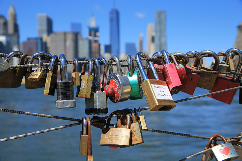 A view of love padlocks attached to the railings of Pier 1 in Brooklyn across the East River in New York City on August 23, 2016. (Gordon Donovan/Yahoo News)