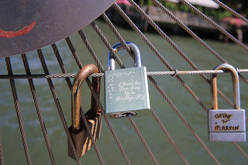 A view of an inscribed love lock attached to the railings of Pier 1 in Brooklyn on August 23, 2016. (Gordon Donovan/Yahoo News)