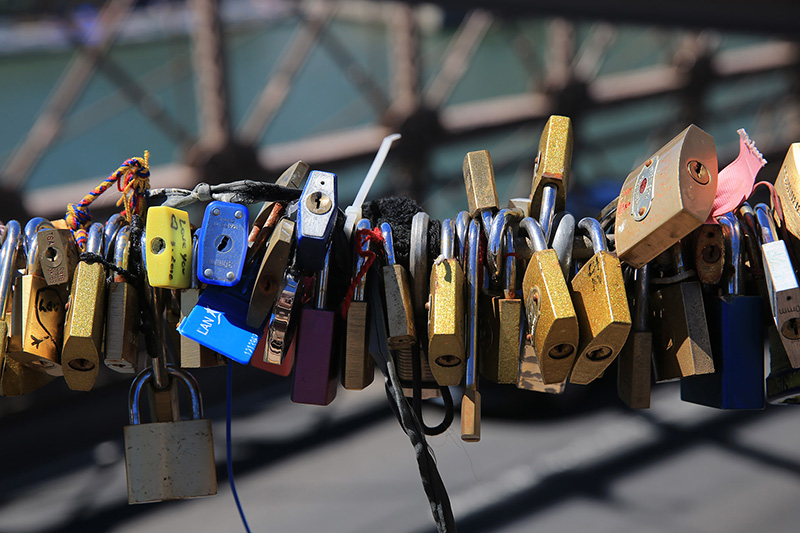 In 2015, more than 45 tons of padlocks, like the ones seen here on the Brooklyn Bridge, were removed from several bridges in Paris. (Gordon Donovan/Yahoo News)