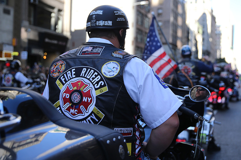 A member of the Fire Riders rides a motorcycle up Fifth Avenue during the Veterans Day parade on Fifth Avenue in New York on Nov. 11, 2016. (Gordon Donovan/Yahoo News)