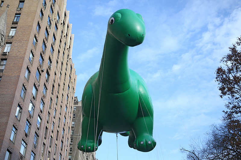The Dino balloon floats in the 90th Macy’s Thanksgiving Day Parade in New York, Thursday, Nov. 24, 2016. (Gordon Donovan/Yahoo News)