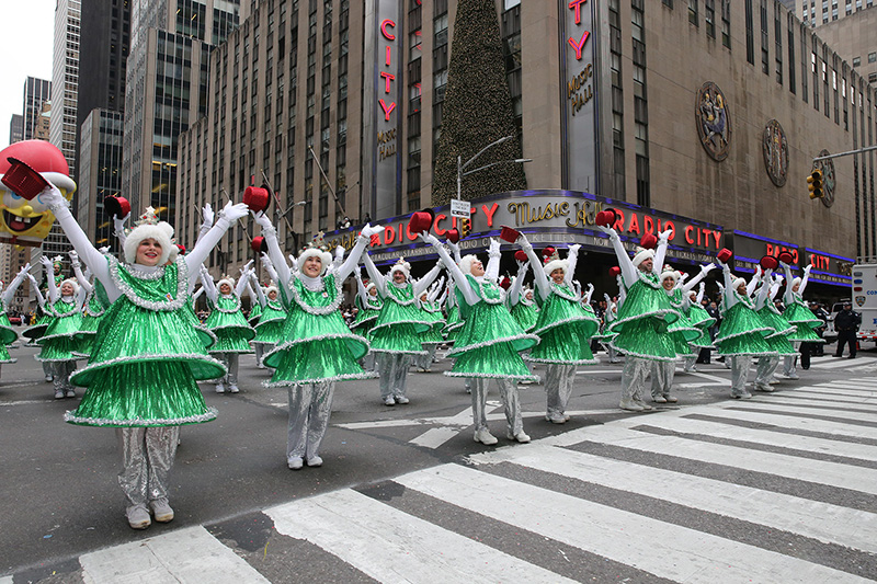 Tap Dancing Christmas Trees perform for the crowd in front of Radio City Music Hall in the 90th Macy’s Thanksgiving Day Parade in New York, Thursday, Nov. 24, 2016. (Gordon Donovan/Yahoo News)