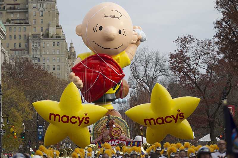 The start of the parade as the Yellow Macy Stars with Charlie Brown move down Central Park West in the 90th Macy’s Thanksgiving Day Parade in New York, Thursday, Nov. 24, 2016. (Gordon Donovan/Yahoo News)