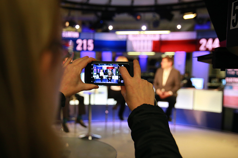 A staffer takes a photo of the Yahoo News election panel at the Yahoo News Studios on Tuesday, Nov. 8, 2016. (Gordon Donovan/Yahoo News)