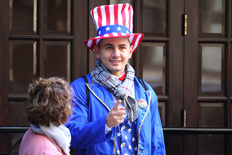 A voter dressed as Uncle Sam waits in line to vote on Tuesday, Nov. 8, 2016, in New York. (Gordon Donovan/Yahoo News)