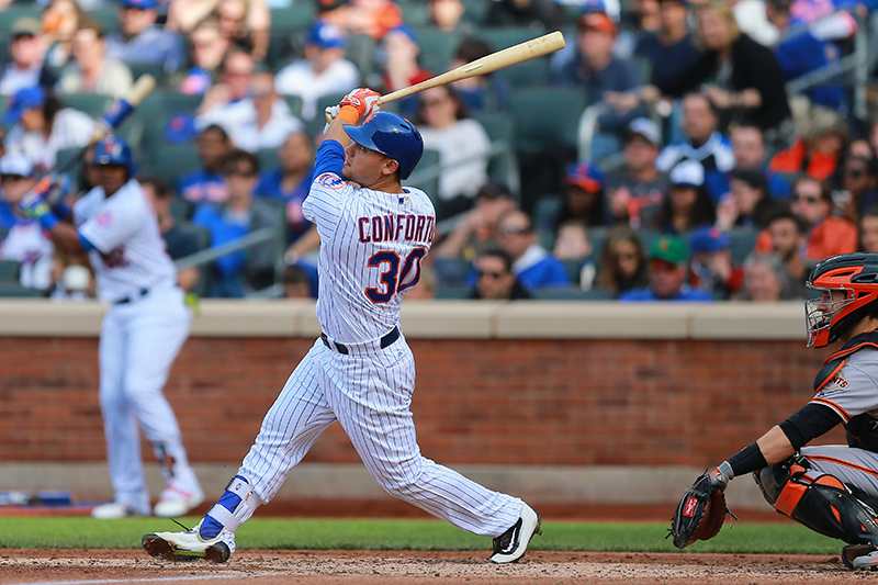 New York Mets Michael Conforto (30) homers in the fifth inning of a baseball game against the San Francisco Giants at Citi Field in New York, Saturday, April 30, 2016. (Gordon Donovan)