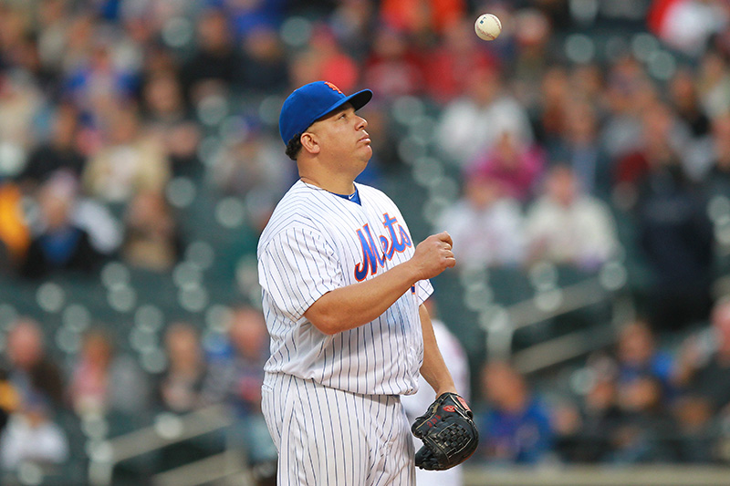 New York Mets starting pitcher Bartolo Colon (40) has a private catch in the first inning of a baseball game against the Atlanta Braves at Citi Field in New York, Monday, May 2, 2016. (Gordon Donovan)