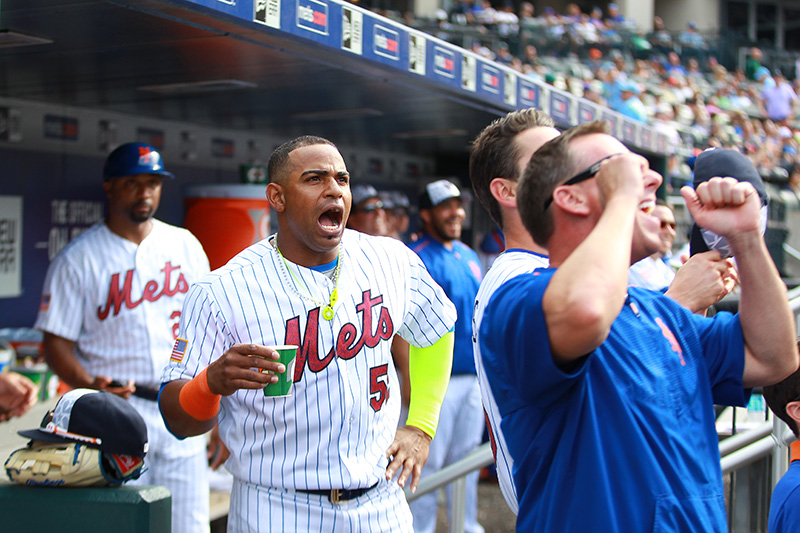 New York Mets Yoenis Cespedes yells as Mets staff cheer on a young fan setting a whiffle ball home run record on Citi Vision in the fourth inning of a baseball game against the Miami Marlins at Citi Field in New York, Monday, July 4, 2016. (Gordon Donovan)