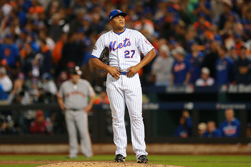 New York Mets relief pitcher Jeurys Familia (27) stands on the mound in disbelief after surrendering a three-run homer in the ninth inning of a National League wild-card baseball game against the San Francisco Giants at Citi Field in New York, Wednesday, October 5, 2016. The Giants defeated the Mets 3-0 to advance to the NLDS. (Gordon Donovan)