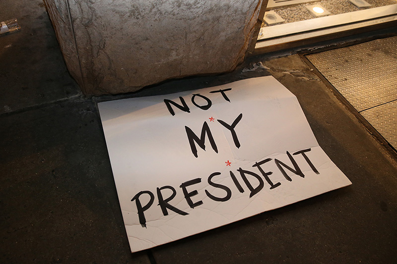 Discarded sign "Not My President" from Women's March in New York City on Jan. 21, 2017. (Gordon Donovan/Yahoo News)