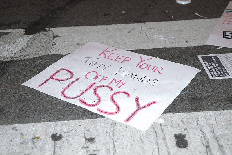Discarded signs from Women's March in New York City on Jan. 21, 2017. (Gordon Donovan/Yahoo News)
