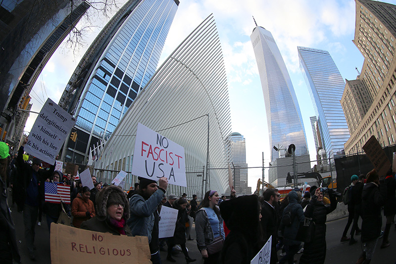 Demonstrators march in front of the World Trade Center site in New York, Jan. 29, 2017, protesting President Donald Trump's immigration order. (Gordon Donovan/Yahoo News)