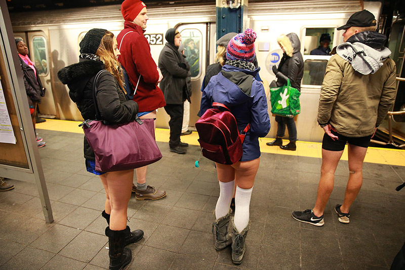 Passengers wait for the subway as they take part in the No Pants Subway Ride in New York City, Sunday, Jan. 8, 2017. The No Pants Subway Ride began in 2002 in New York as a stunt and has taken place in cities around the world since then. (Gordon Donovan/Yahoo News)