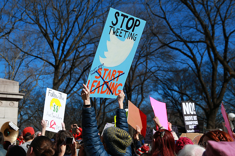A protester holds up a sign addressing President Trump’s constant use of his Twitter account at the “Not My President’s Day” rally at Central Park West in New York City on Feb. 20, 2017. (Gordon Donovan/Yahoo News)