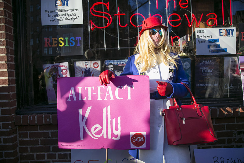A man in drag campaigns in front of the Stonewall Inn in solidarity with immigrants, asylum seekers, refugees, and the LGBT community, Feb. 4, 2017 in New York. (Photo: Gordon Donovan/Yahoo News)