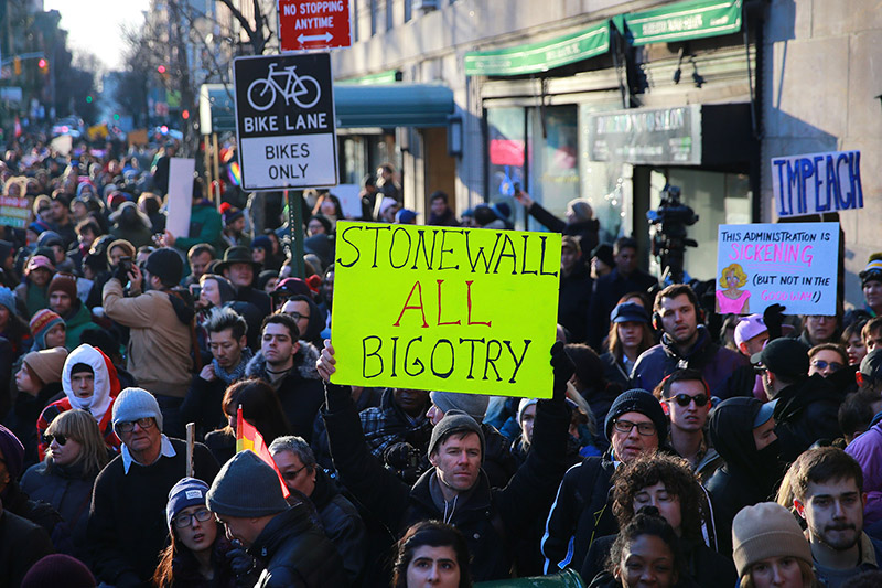 People protest in front of the Stonewall Inn in solidarity with immigrants, asylum seekers, refugees, and the LGBT community, Feb. 4, 2017 in New York. (Photo: Gordon Donovan/Yahoo News)