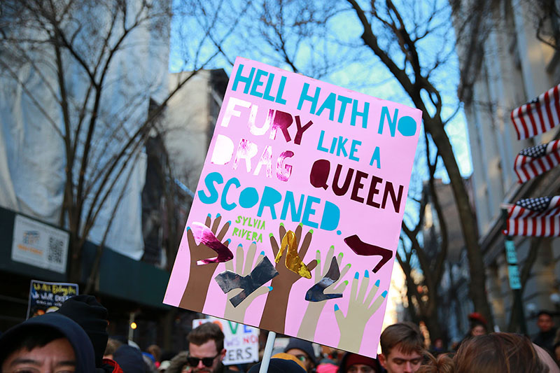 A person holds up a sign at a rally in solidarity with immigrants, asylum seekers, refugees, and the LGBT community, Feb. 4, 2017 in New York. (Photo: Gordon Donovan/Yahoo News)