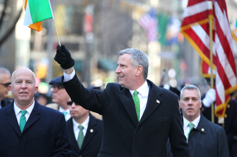 New York City Mayor Bill de Blasio waves a flag while marching in the St. Patrick's Day Parade, March 17, 2017, in New York. (Gordon Donovan/Yahoo News)