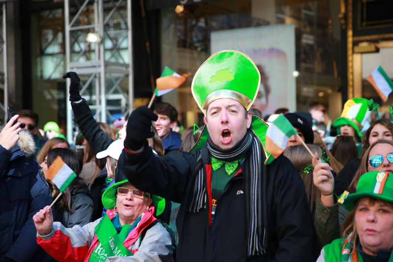 Participants celebrate while watching marchers in the St. Patrick's Day Parade, March 17, 2017, in New York. (Gordon Donovan/Yahoo News)