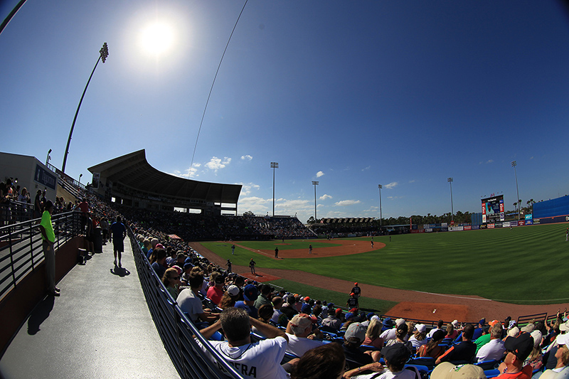 Fans watch the baseball game between the Detroit Tigers and New York Mets from the berm at First Data Field in Port St. Lucie, Fl., Sunday, Feb. 26, 2017. (Gordon Donovan/Yahoo Sports)