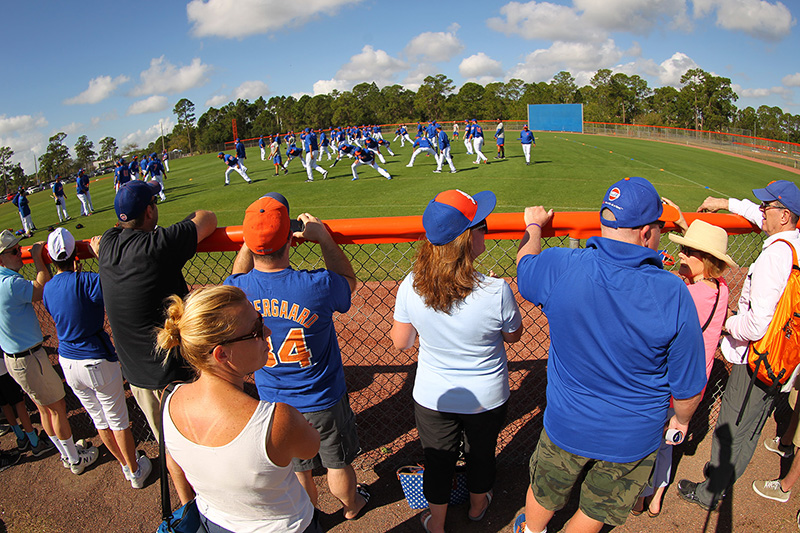 New York Mets fans line the fences to watch players loosen up before morning workouts at the New York Mets spring training facility at First Data Field in Port St. Lucie, Fl., Thursday, March 2, 2017. (Gordon Donovan/Yahoo Sports)