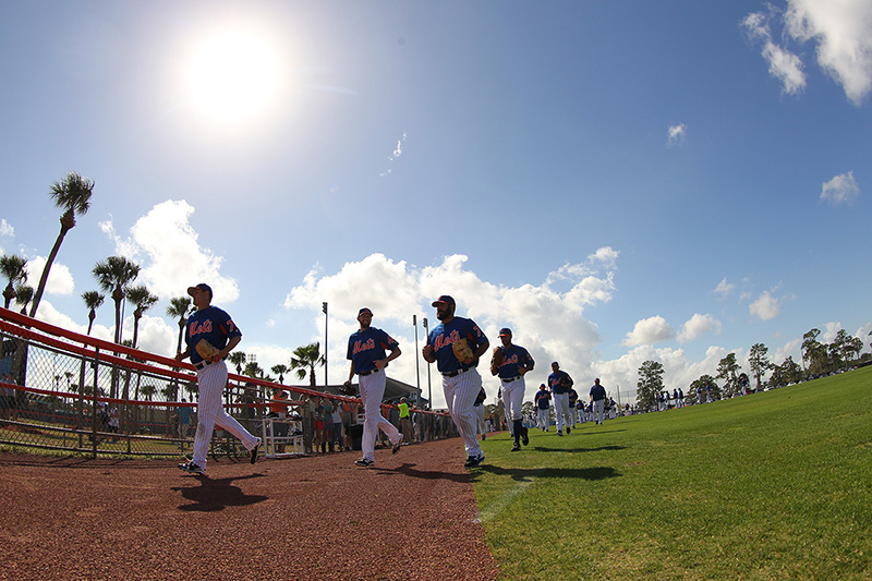 New York Mets players run off the practice field for more drills at New York Mets spring training facility in Port St. Lucie, Fl., Thursday, March 2, 2017. (Gordon Donovan/Yahoo Sports)