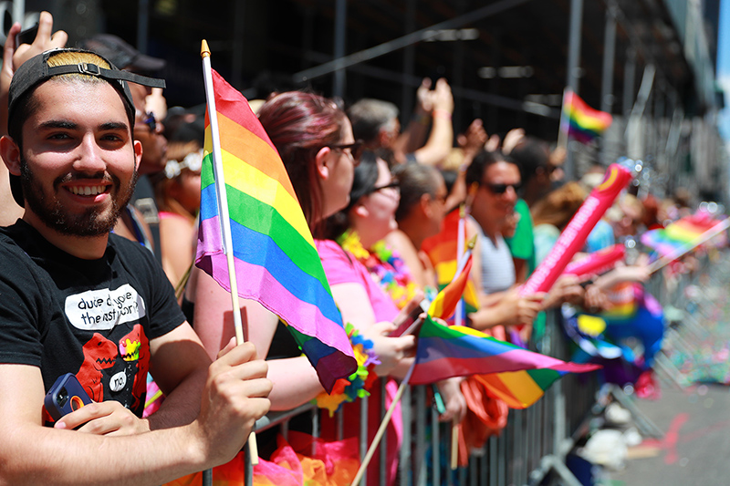 People cheer and wave rainbow flags during the N.Y.C. Pride Parade in New York on June 25, 2017. (Photo: Gordon Donovan/Yahoo News)