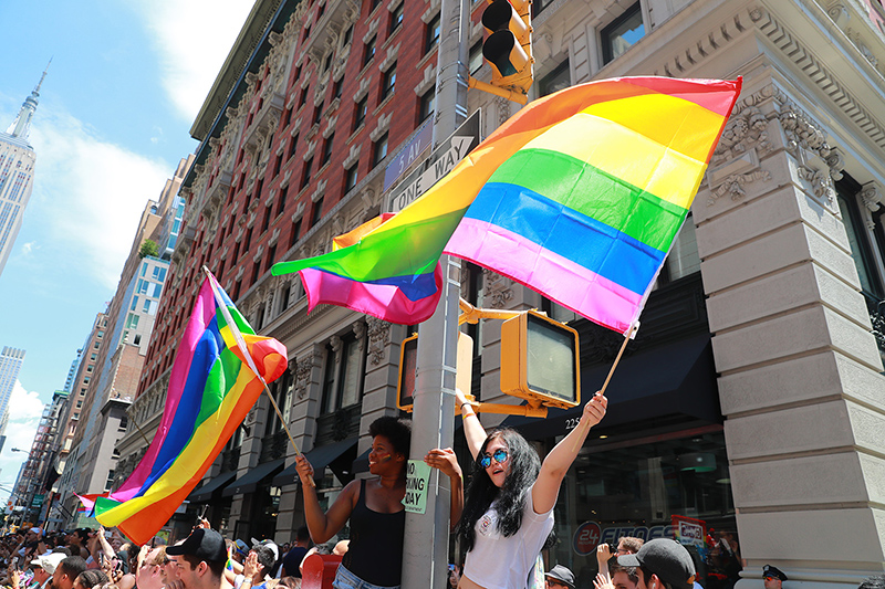 People wave rainbow flags on top street posts during the N.Y.C. Pride Parade in New York on June 25, 2017. (Photo: Gordon Donovan/Yahoo News)