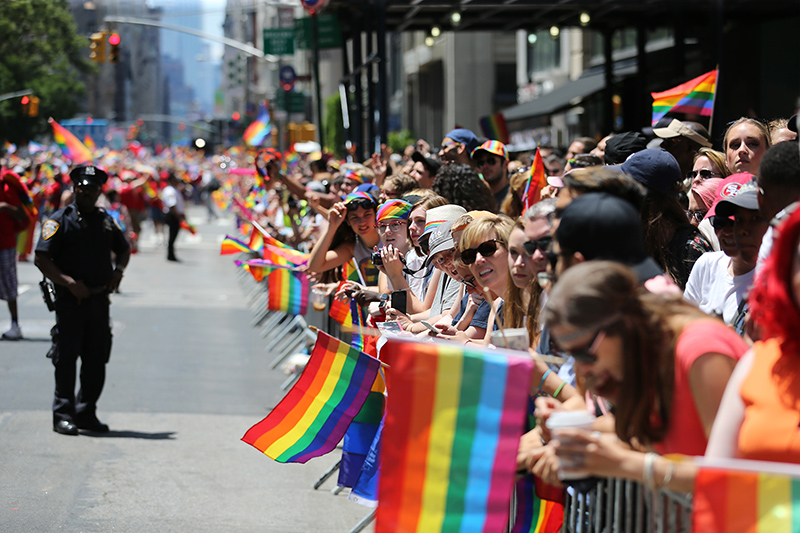 People wave rainbow flags during the N.Y.C. Pride Parade in New York on June 25, 2017. (Photo: Gordon Donovan/Yahoo News)